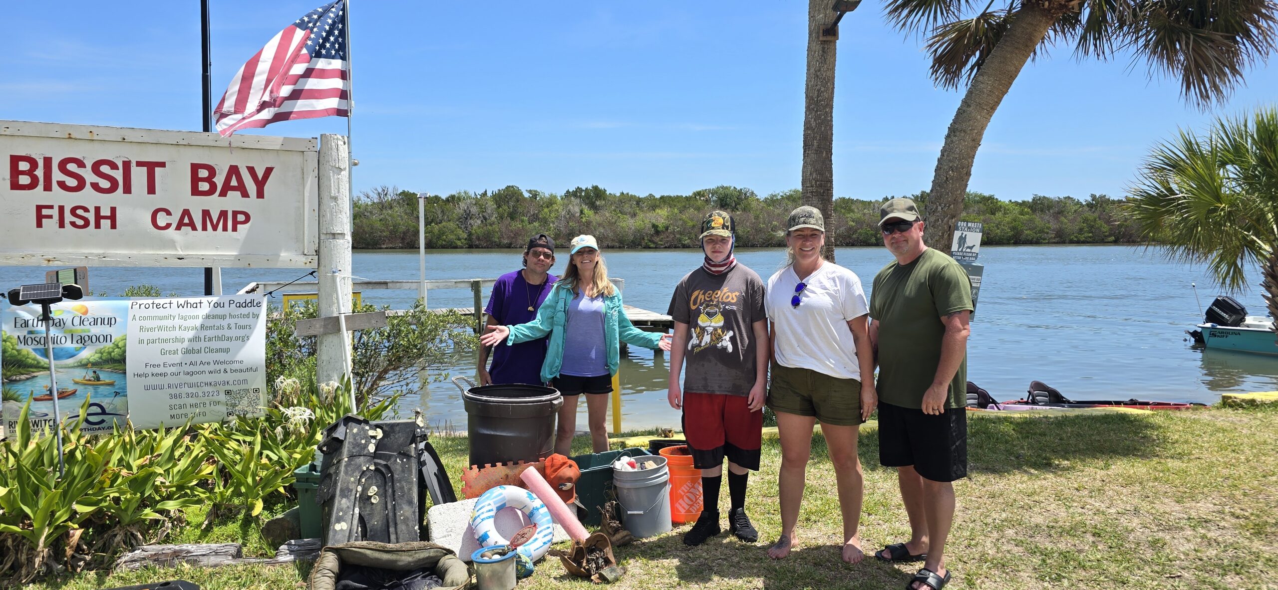Photo of a group of people and trash they collected